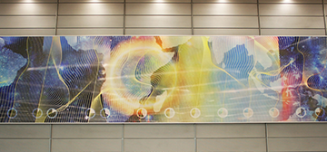 Colorful swirling textures and lines fill this large, horizontal mural.