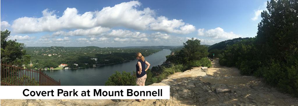 Color photo of a woman looking out over Hill Country views from the top of Mount Bonnell