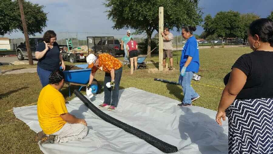 Mendez students preparing their garden beds.