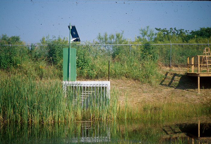 Storm water monitoring station at St. Elmo Recreational detention Pond. A flood control retention pond.  