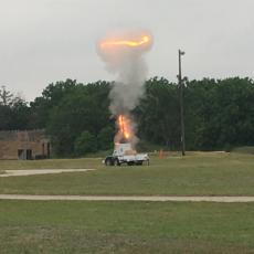 A photo showing a controlled explosion for demonstration purposes.