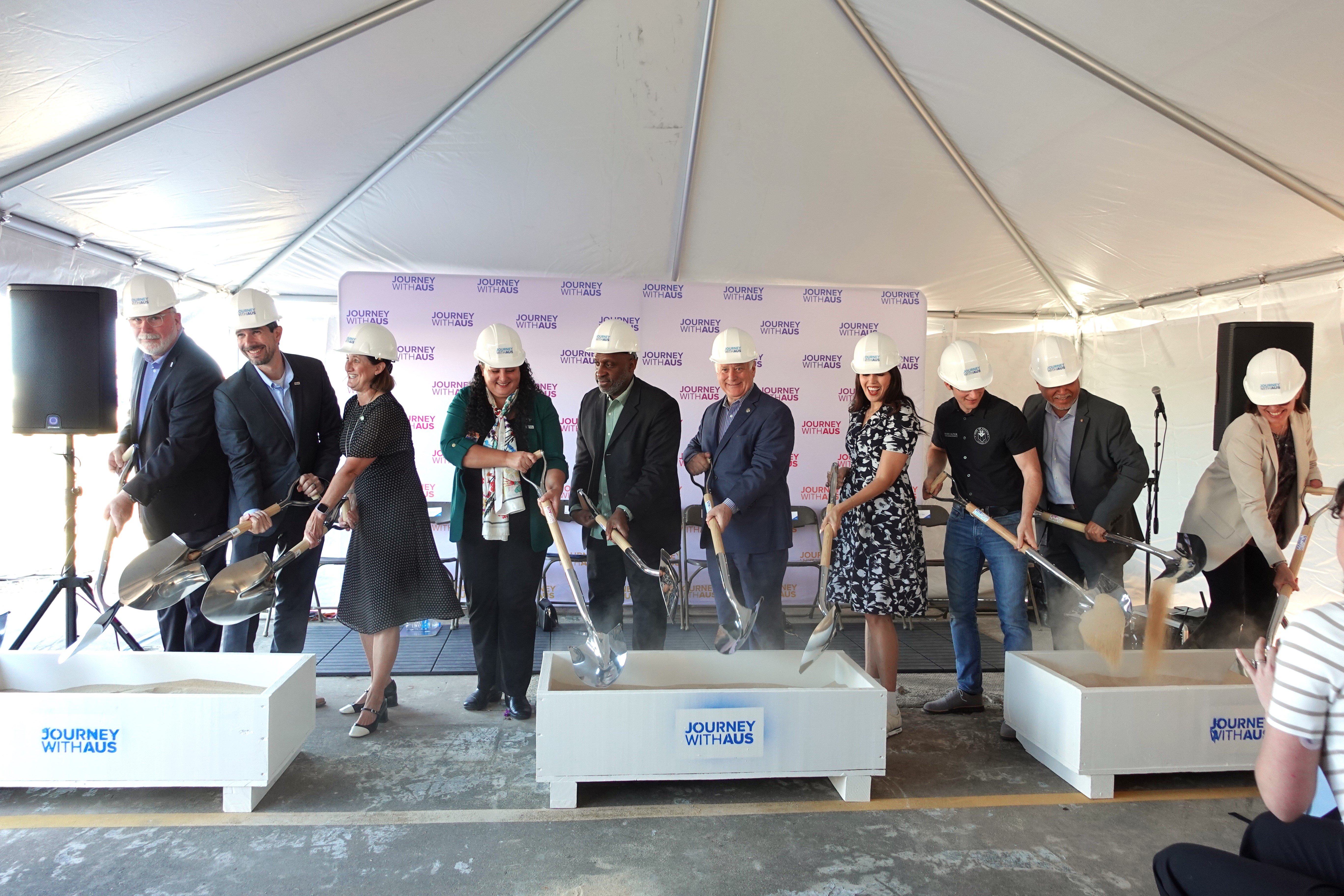 From left to right: Joe McLaughlin, Austin Bridge and Road; Byron Chavez, RS&H; Deputy Administrator Katie Thomson, FAA; Ghizlane Badawi, CEO Austin Airport; City Manager T.C. Broadnax; Mayor Kirk Watson; Councilmember Vanessa Fuentes; Councilmember Ryan Alter; Director Jose Roig, Development Services Department; and Director Shay Roalson, Austin Water. 