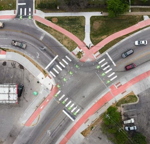 PROTECTED INTERSECTION DESIGN AT PAYTON GIN AND OLHEN THAT IMPROVES SAFETY AND SHORTENS CROSSING DISTANCES FOR PEOPLE WALKING AND BICYCLING