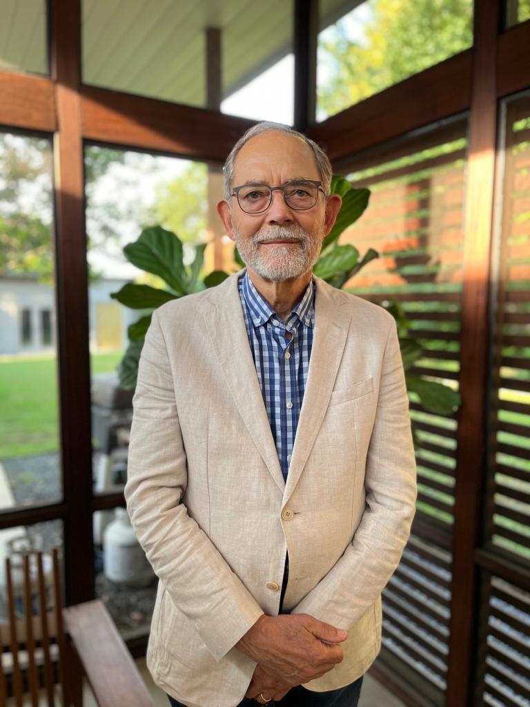 Chuck Naeve standing in his home for a personal photo of himself today.