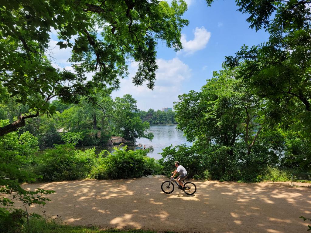 Cyclist on hike and bike trail near barking springs