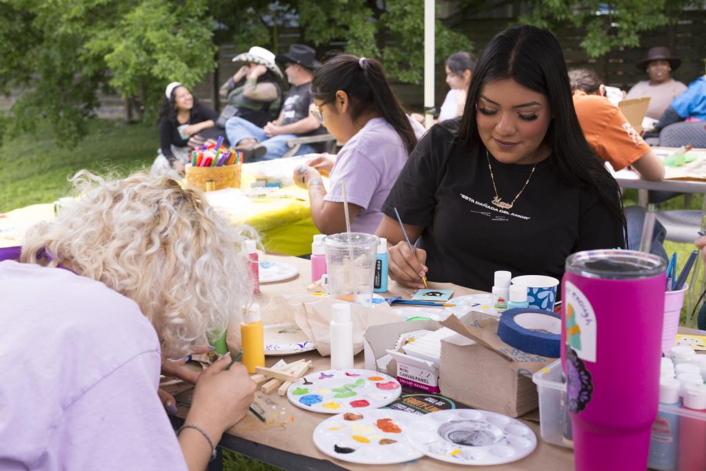 Women making art outdoors