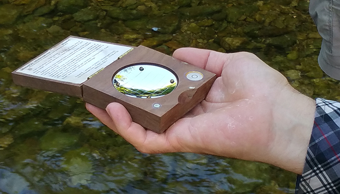 A concave densiometer is used to quantify the amount of tree canopy shading the stream