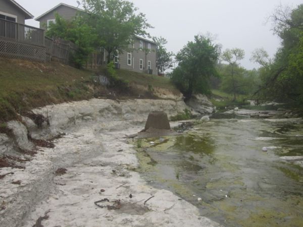 Erosion along creek at Park Plaza