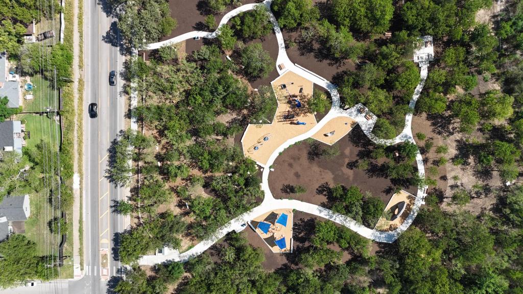 An overhead photo of the new play area at Little Walnut Creek, showing walking paths and seperate areas for fitness equipment, nature play, and a playscape.
