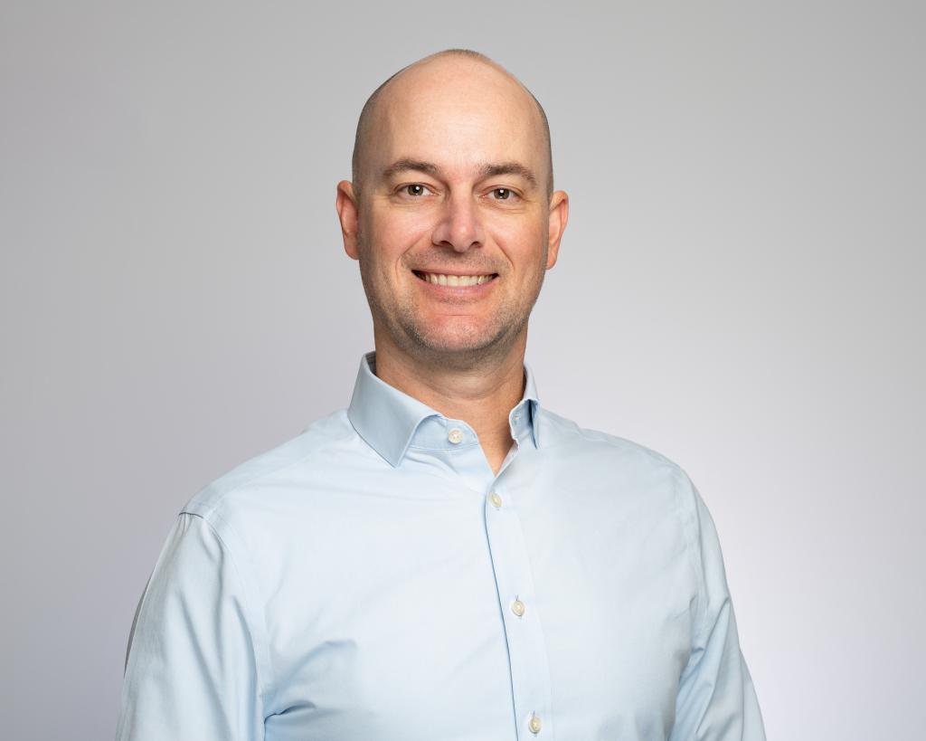 Headshot of man smiling