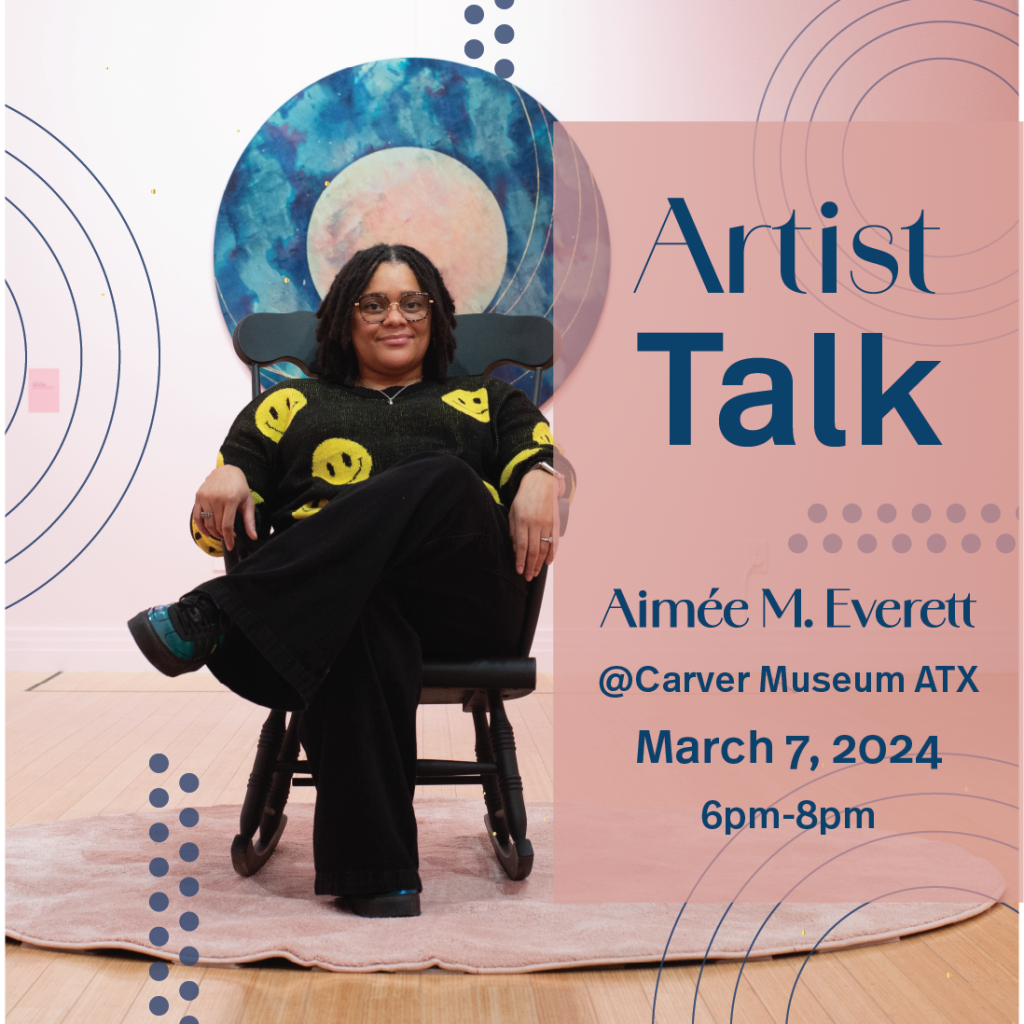artist Aimeé M. Everett sitting in rocking chair at her exhibit at the Carver Museum in Austin, TX 