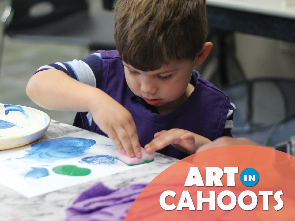 A child creating a painting with a sponge and the text 'Art In Cahoots'