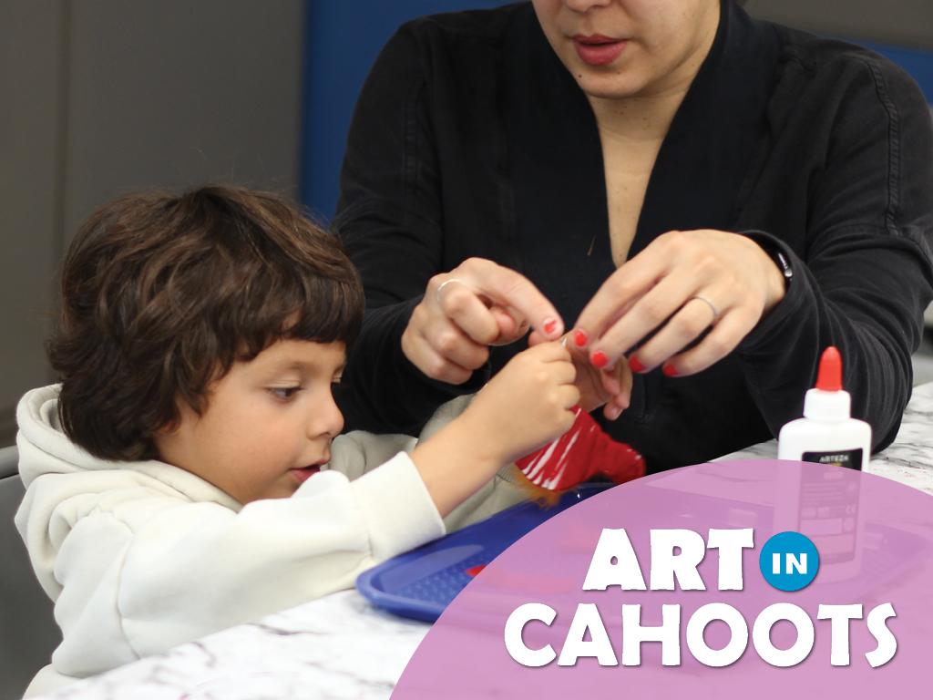 An image of an adult and child creating art with the text 'Art In Cahoots'