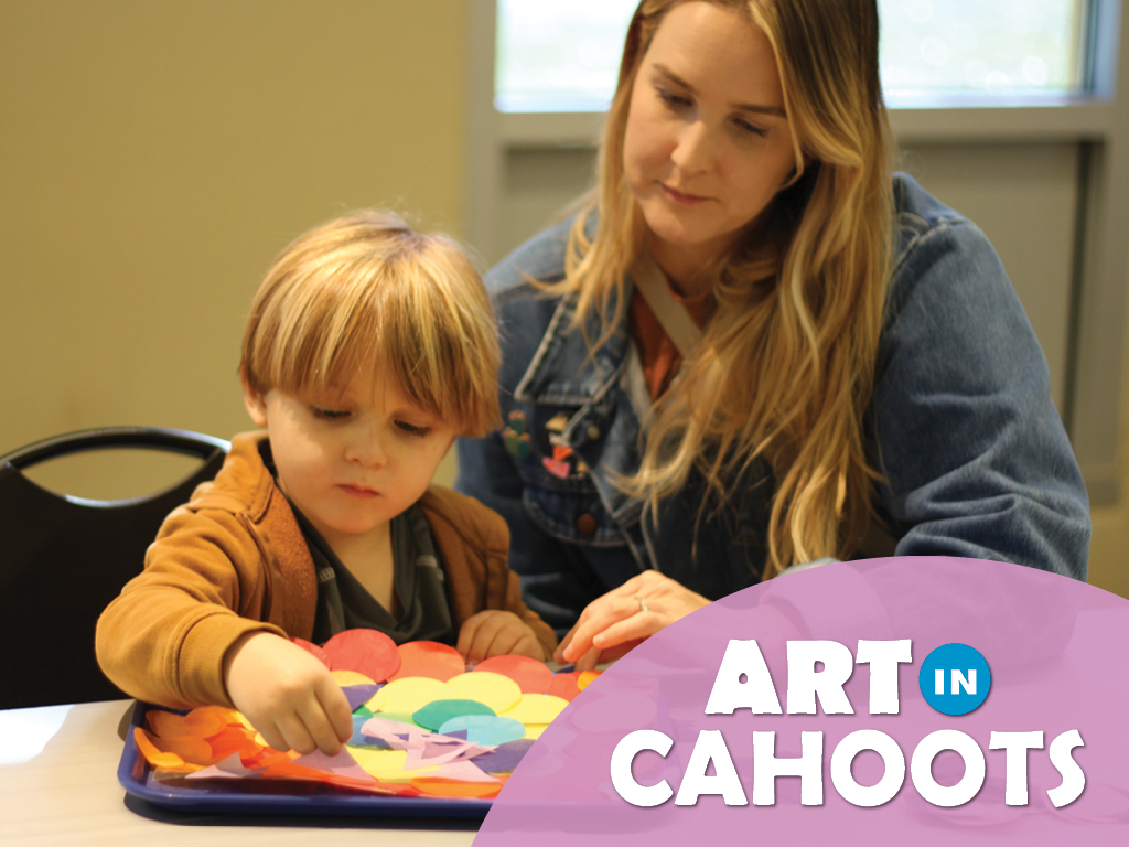 An image of a child and an adult making art with the text 'Art In Cahoots'