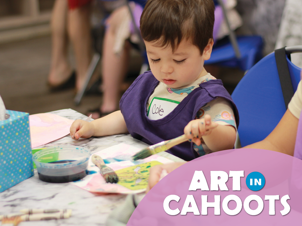 An image of a child painting and the text 'Art In Cahoots'