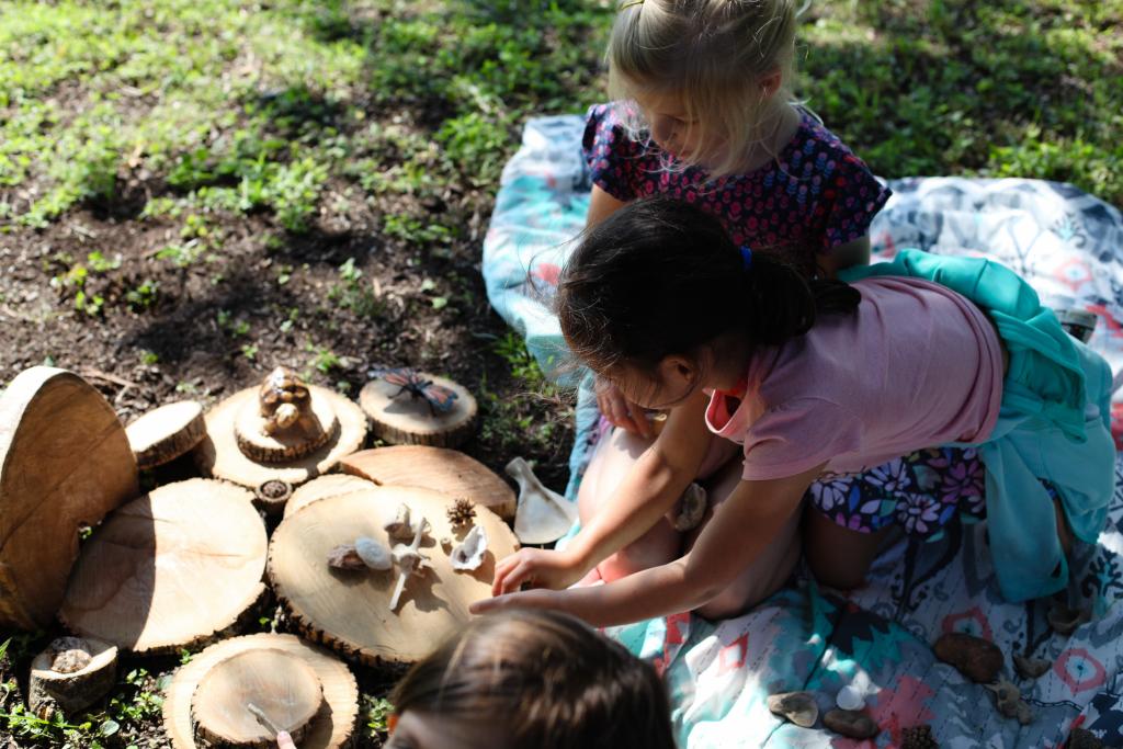 Children engaging in nature play.