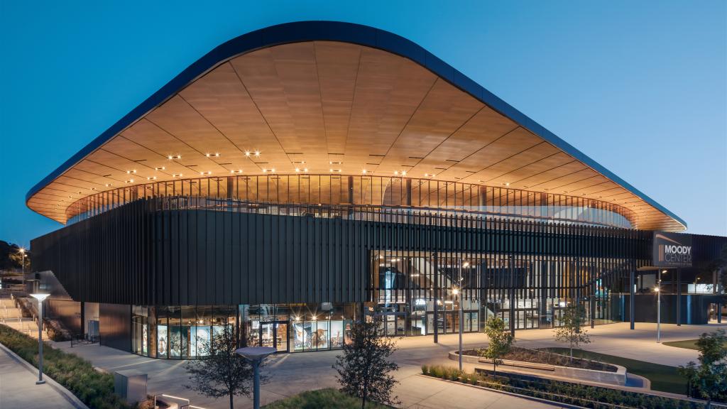 The Moody Center from outside at night.