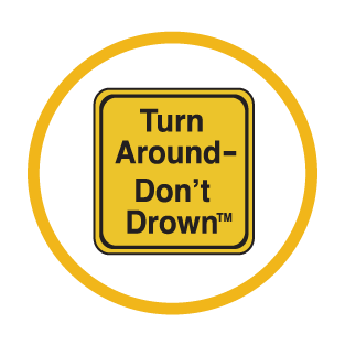 Yellow Turn Around Don't Drown sign