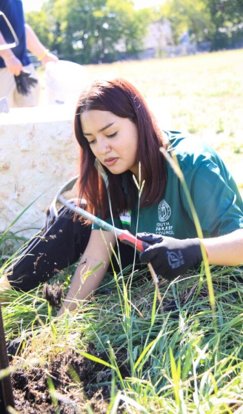 Yasmine working with the soil