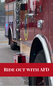 Close up shot of Austin Fire Department engine with ride out with AFD copy in white