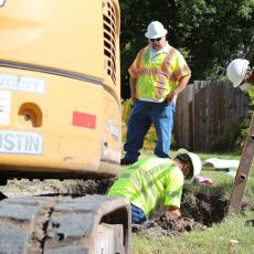 Field crews excavating